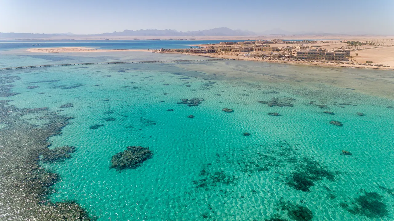 Coral reef and jetty at Soma Bay